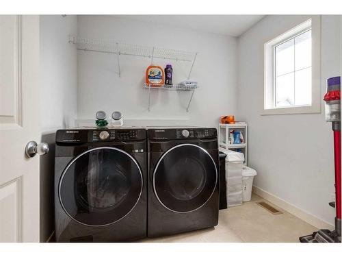 75 Evansview Point Nw, Calgary, AB - Indoor Photo Showing Laundry Room