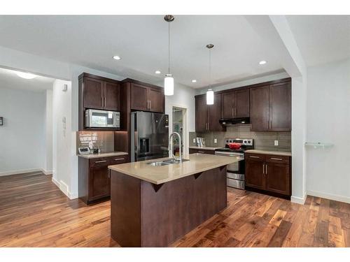 75 Evansview Point Nw, Calgary, AB - Indoor Photo Showing Kitchen With Stainless Steel Kitchen With Double Sink With Upgraded Kitchen