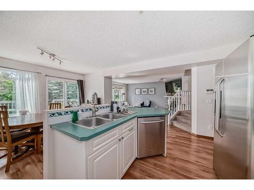 56 Somercrest Grove Sw, Calgary, AB - Indoor Photo Showing Kitchen With Double Sink