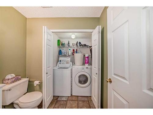 56 Somercrest Grove Sw, Calgary, AB - Indoor Photo Showing Laundry Room