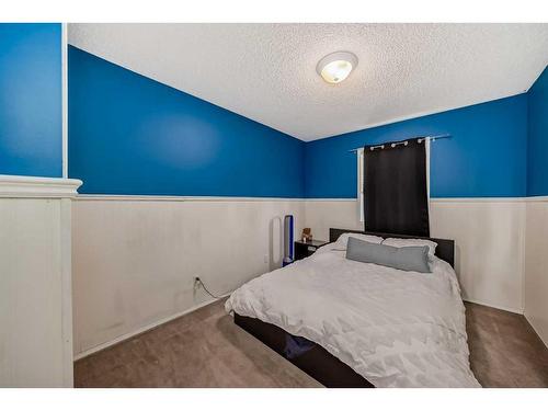56 Somercrest Grove Sw, Calgary, AB - Indoor Photo Showing Bedroom