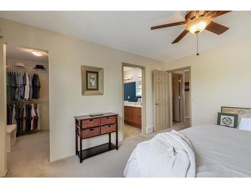 38 Crystal Shores Heights, Okotoks, AB - Indoor Photo Showing Bedroom