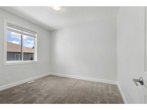 270 Carringham Road Nw, Calgary, AB - Indoor Photo Showing Other Room