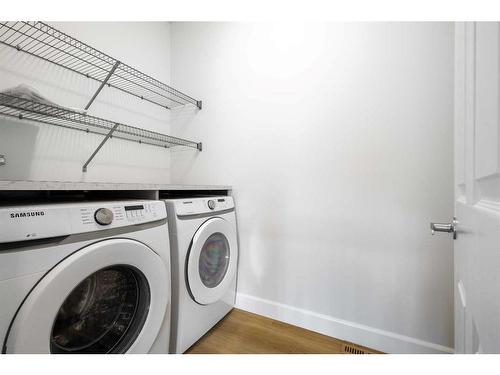 270 Carringham Road Nw, Calgary, AB - Indoor Photo Showing Laundry Room