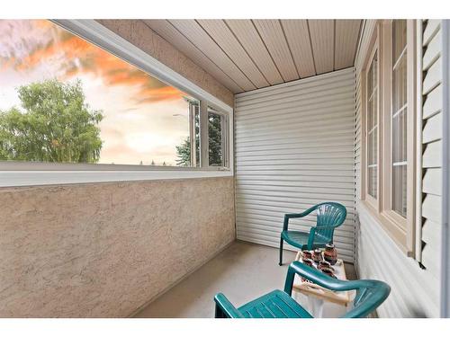 95 Millbank Hill Sw, Calgary, AB - Outdoor With Deck Patio Veranda With Exterior