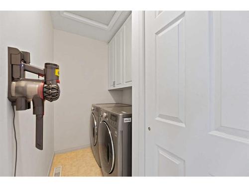 95 Millbank Hill Sw, Calgary, AB - Indoor Photo Showing Laundry Room