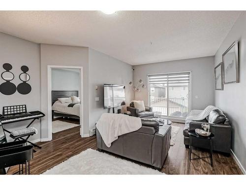 1214-1140 Taradale Drive Ne, Calgary, AB - Indoor Photo Showing Living Room