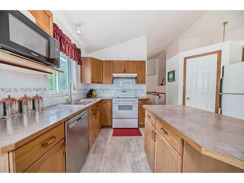 1101 Sierra Morena Court Sw, Calgary, AB - Indoor Photo Showing Kitchen With Double Sink