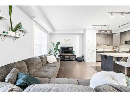 147 Cranford Walk Se, Calgary, AB - Indoor Photo Showing Living Room