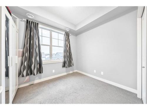 147 Cranford Walk Se, Calgary, AB - Indoor Photo Showing Other Room
