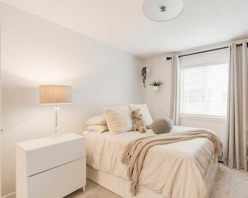 119-260 Shawville Way Se, Calgary, AB - Indoor Photo Showing Bedroom