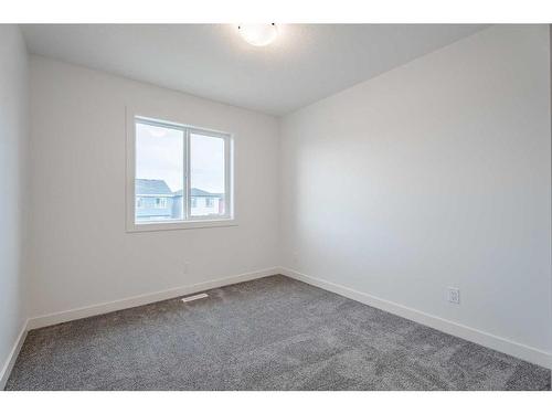 37 Amblefield Passage Nw, Calgary, AB - Indoor Photo Showing Other Room
