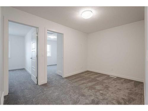 37 Amblefield Passage Nw, Calgary, AB - Indoor Photo Showing Other Room