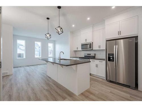37 Amblefield Passage Nw, Calgary, AB - Indoor Photo Showing Kitchen With Stainless Steel Kitchen With Upgraded Kitchen