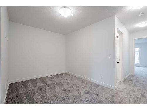 37 Amblefield Passage Nw, Calgary, AB - Indoor Photo Showing Other Room