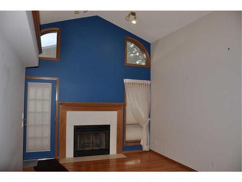 162 Oakbriar Close Sw, Calgary, AB - Indoor With Fireplace