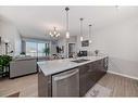 507-2231 Mahogany Boulevard Se, Calgary, AB  - Indoor Photo Showing Kitchen With Double Sink With Upgraded Kitchen 