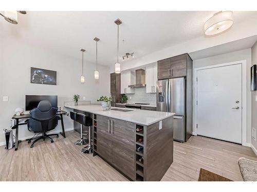507-2231 Mahogany Boulevard Se, Calgary, AB - Indoor Photo Showing Kitchen With Upgraded Kitchen