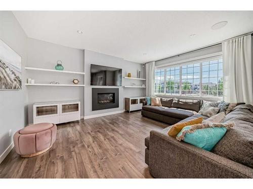 108 Masters Court Se, Calgary, AB - Indoor Photo Showing Living Room With Fireplace