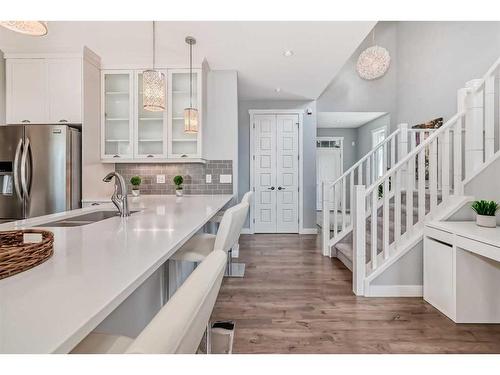 108 Masters Court Se, Calgary, AB - Indoor Photo Showing Kitchen With Double Sink With Upgraded Kitchen