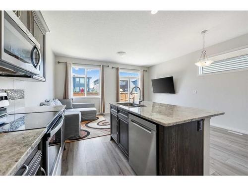 45 Legacy Glen Street Se, Calgary, AB - Indoor Photo Showing Kitchen With Stainless Steel Kitchen With Double Sink