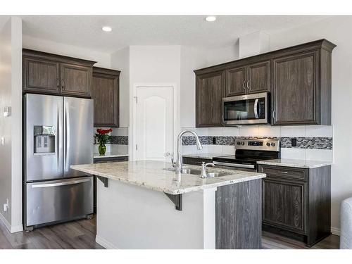 45 Legacy Glen Street Se, Calgary, AB - Indoor Photo Showing Kitchen With Stainless Steel Kitchen With Double Sink With Upgraded Kitchen