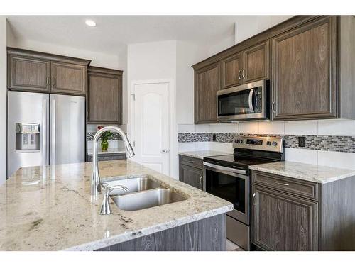 45 Legacy Glen Street Se, Calgary, AB - Indoor Photo Showing Kitchen With Stainless Steel Kitchen With Double Sink With Upgraded Kitchen