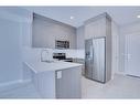 2220-681 Savanna Boulevard Ne, Calgary, AB  - Indoor Photo Showing Kitchen With Stainless Steel Kitchen With Upgraded Kitchen 