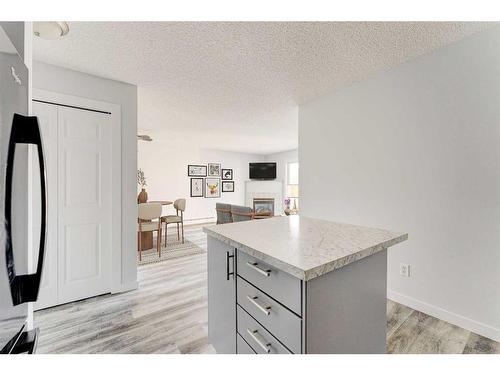 403-6000 Somervale Court Sw, Calgary, AB - Indoor Photo Showing Kitchen With Double Sink