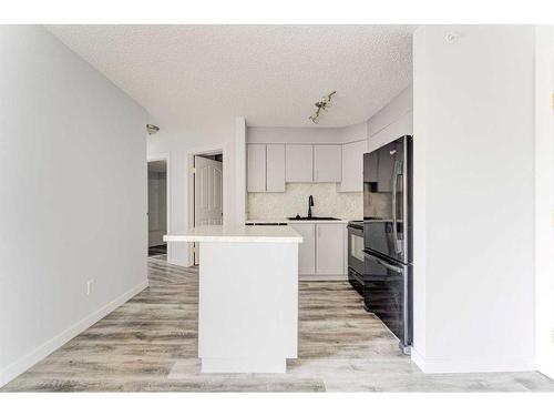 403-6000 Somervale Court Sw, Calgary, AB - Indoor Photo Showing Kitchen