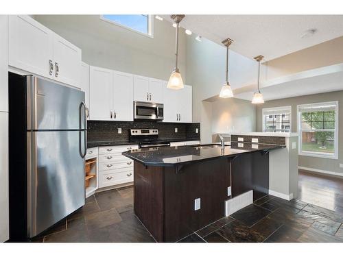1343 New Brighton Park Se, Calgary, AB - Indoor Photo Showing Kitchen With Stainless Steel Kitchen With Upgraded Kitchen