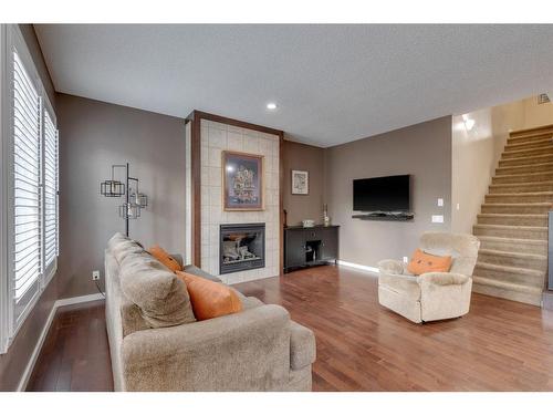 144 Mahogany Terrace Se, Calgary, AB - Indoor Photo Showing Living Room With Fireplace