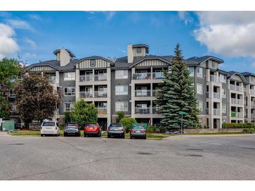 351-35 Richard Court Sw, Calgary, AB - Outdoor With Balcony With Facade