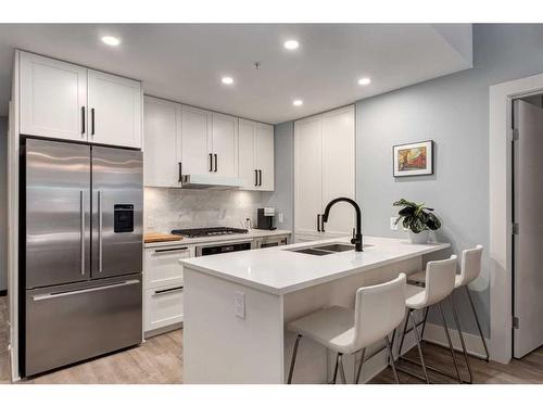 106-46 9 Street Ne, Calgary, AB - Indoor Photo Showing Kitchen With Stainless Steel Kitchen With Double Sink With Upgraded Kitchen