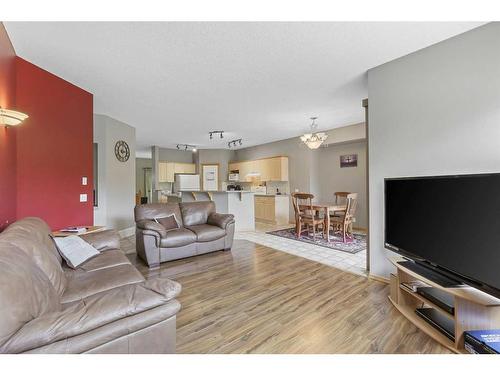 10 Cranston Drive Se, Calgary, AB - Indoor Photo Showing Living Room