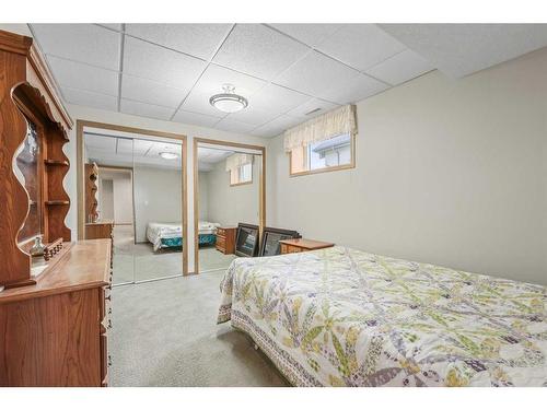10 Cranston Drive Se, Calgary, AB - Indoor Photo Showing Bedroom
