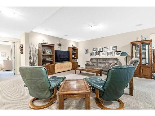 158 Cimarron Drive, Okotoks, AB - Indoor Photo Showing Living Room