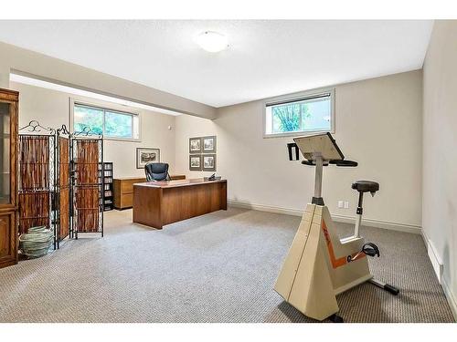 158 Cimarron Drive, Okotoks, AB - Indoor Photo Showing Gym Room