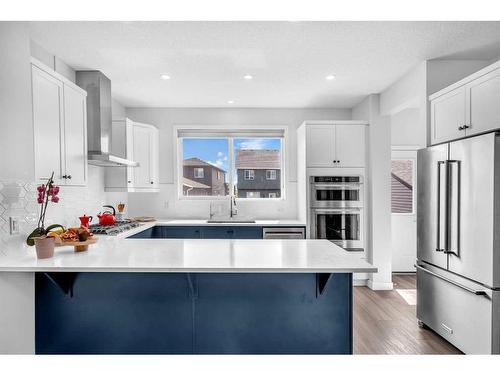 24 Legacy Glen Link Se, Calgary, AB - Indoor Photo Showing Kitchen With Stainless Steel Kitchen With Upgraded Kitchen