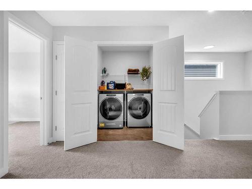 24 Legacy Glen Link Se, Calgary, AB - Indoor Photo Showing Laundry Room