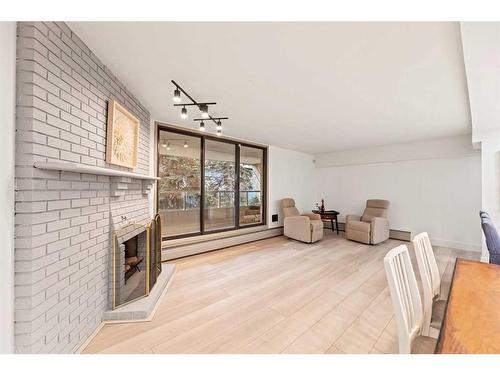 405-1215 Cameron Avenue Sw, Calgary, AB - Indoor With Fireplace