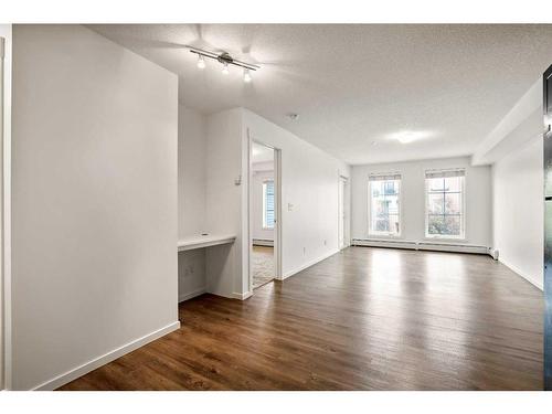 3308-755 Copperpond Boulevard Se, Calgary, AB - Indoor With Fireplace