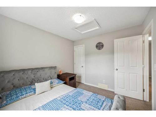 1034 Brightoncrest Common Se, Calgary, AB - Indoor Photo Showing Bedroom