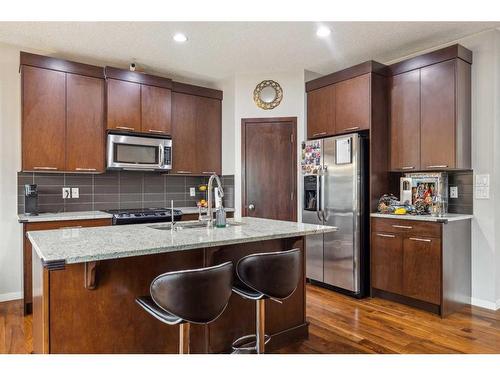 1034 Brightoncrest Common Se, Calgary, AB - Indoor Photo Showing Kitchen With Stainless Steel Kitchen