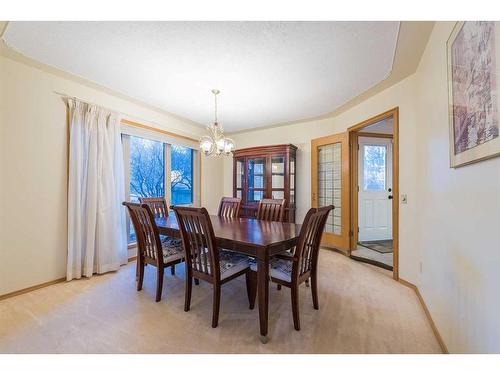 15 Patterson Drive Sw, Calgary, AB - Indoor Photo Showing Dining Room