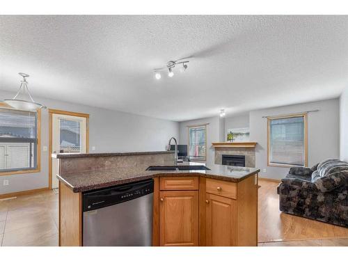 35 Saddleland Drive Ne, Calgary, AB - Indoor Photo Showing Kitchen With Double Sink
