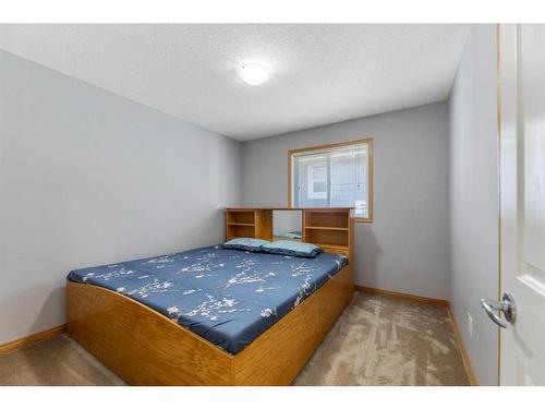 35 Saddleland Drive Ne, Calgary, AB - Indoor Photo Showing Bedroom