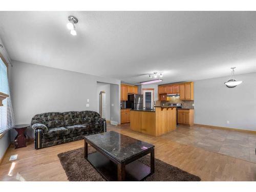 35 Saddleland Drive Ne, Calgary, AB - Indoor Photo Showing Living Room