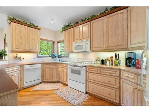 30306 Woodland Heights, Rural Rocky View County, AB - Indoor Photo Showing Kitchen With Double Sink