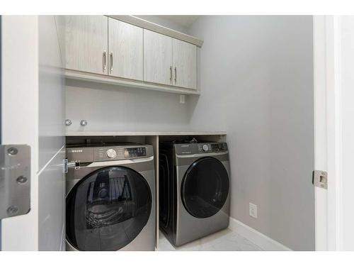 36 Carrington Close Nw, Calgary, AB - Indoor Photo Showing Laundry Room